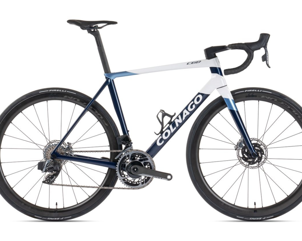 A Colnago C68 carbon disc bike frame in blue and white color scheme, equipped with a CeramicSpeed SLT headset.